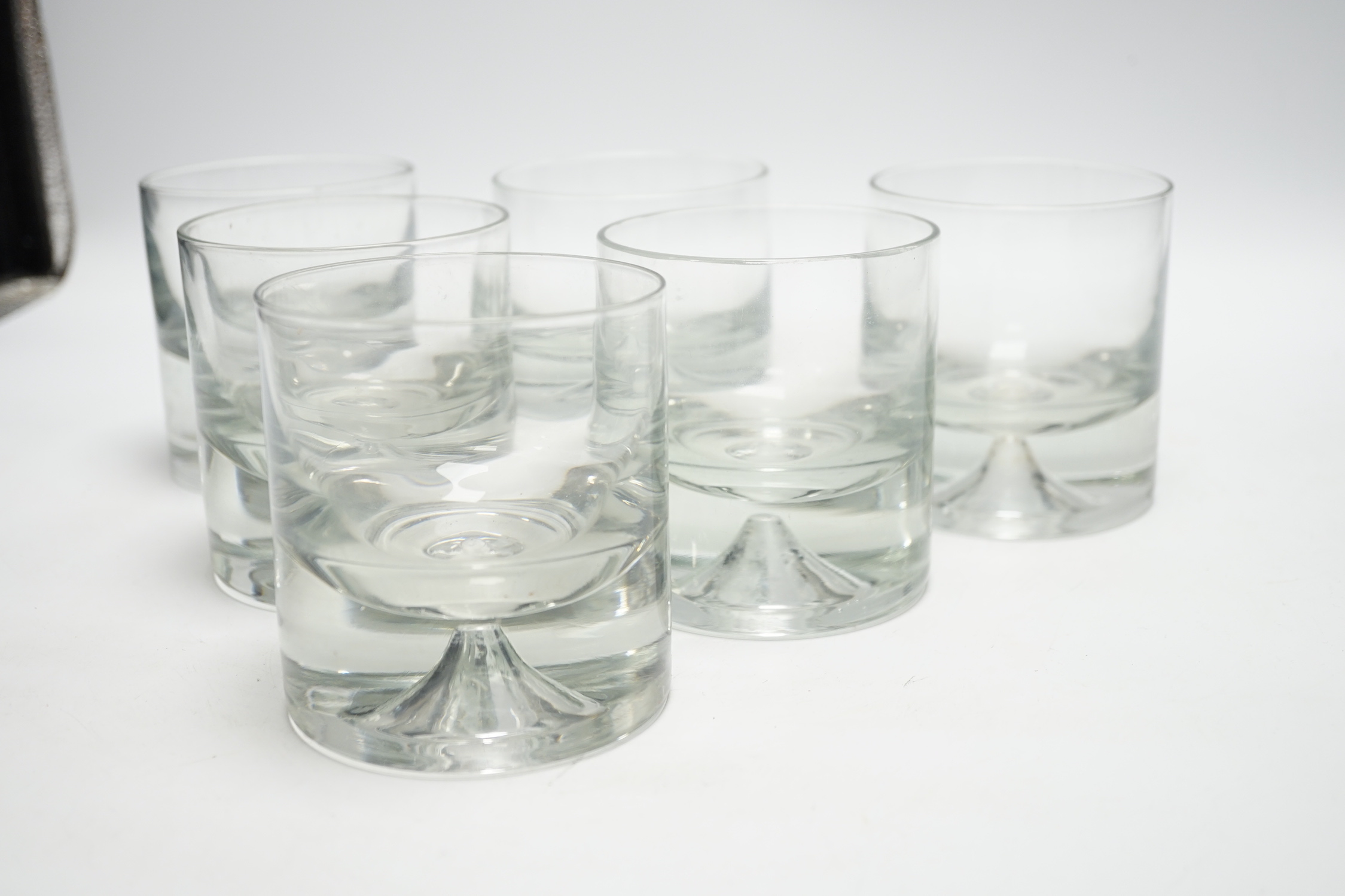 A set of six plain crystal glass tumblers